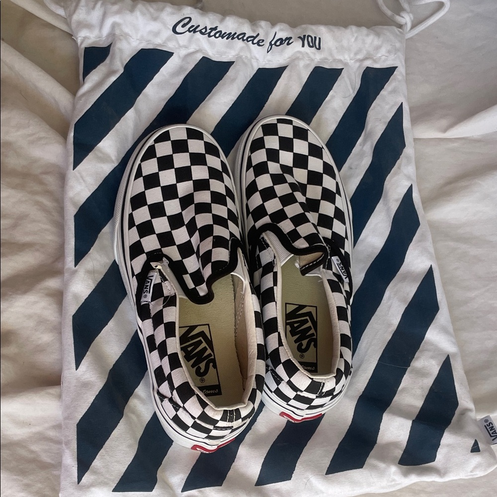 Vans Black and White Checkered Slip-Ons